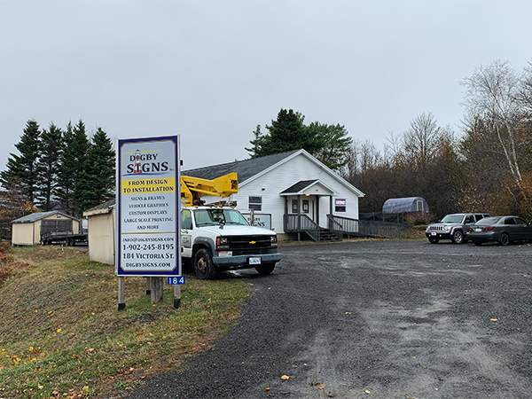 Digby Signs team at work in Digby, Nova Scotia